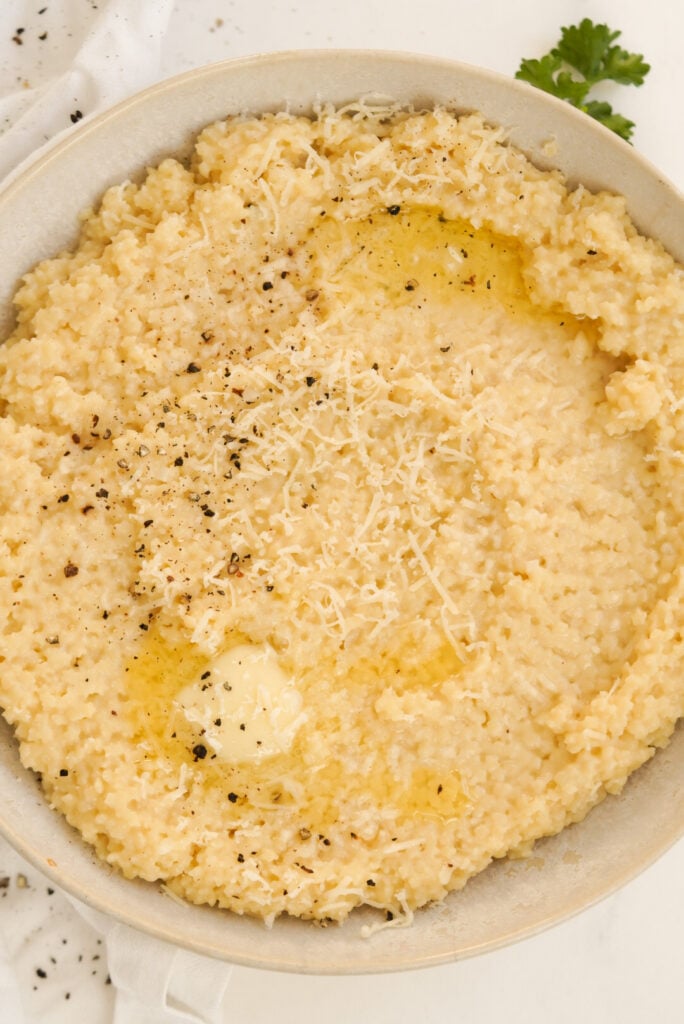 Bowl of tiny star-shaped pasta with butter and parmesan cheese