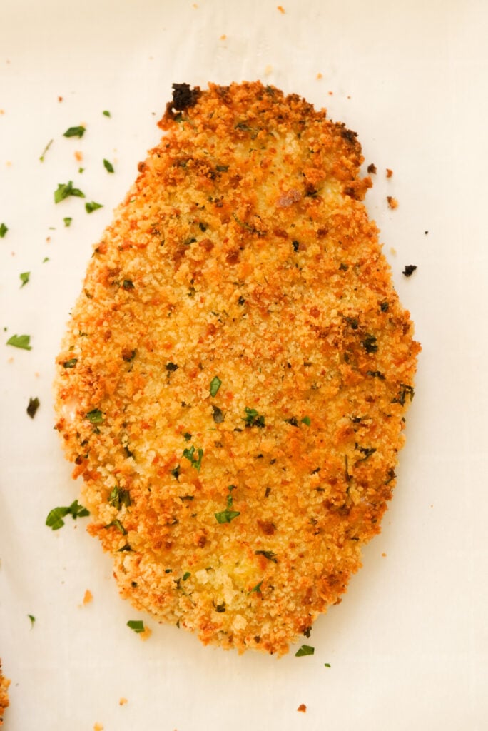 flat lay shot of an oven baked chicken cutlet.