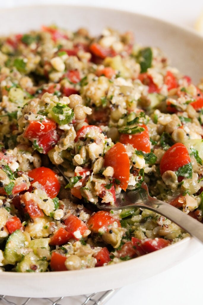  meal prep recipe with quinoa, lentils, veggies, and feta cheese