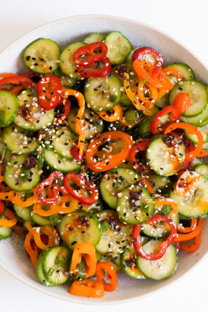 bell pepper and cucumber mixture in a serving bowl