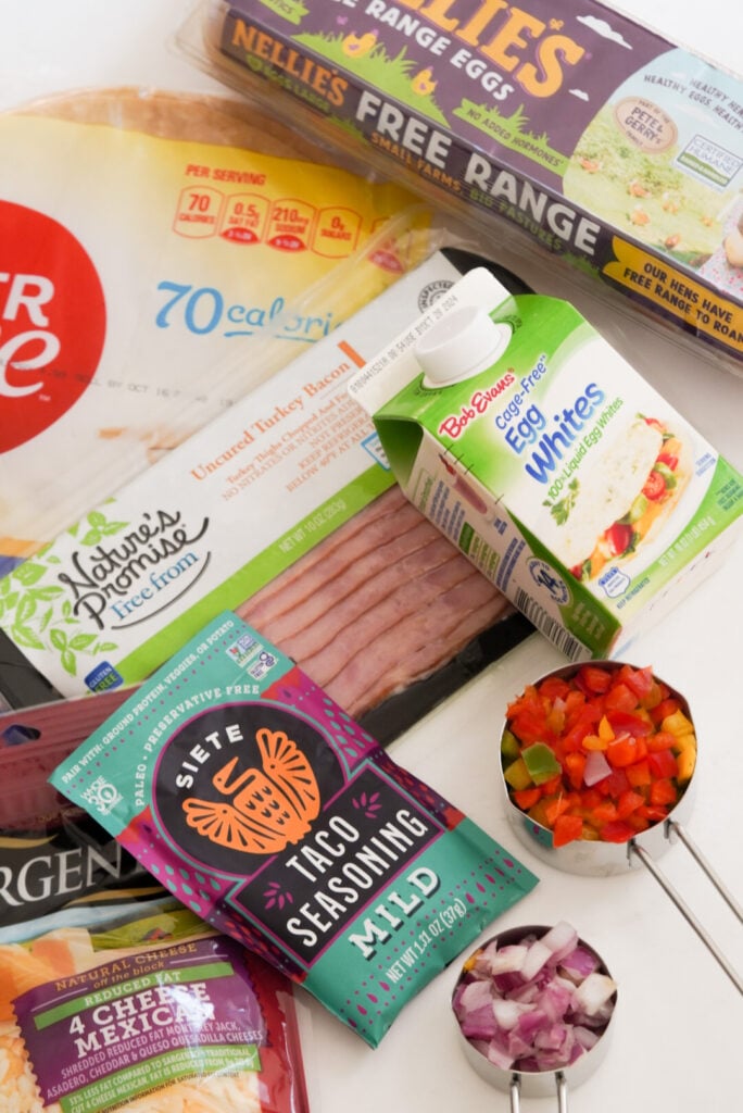 flat lay shot of all the ingredients needed to make high protein breakfast burritos.