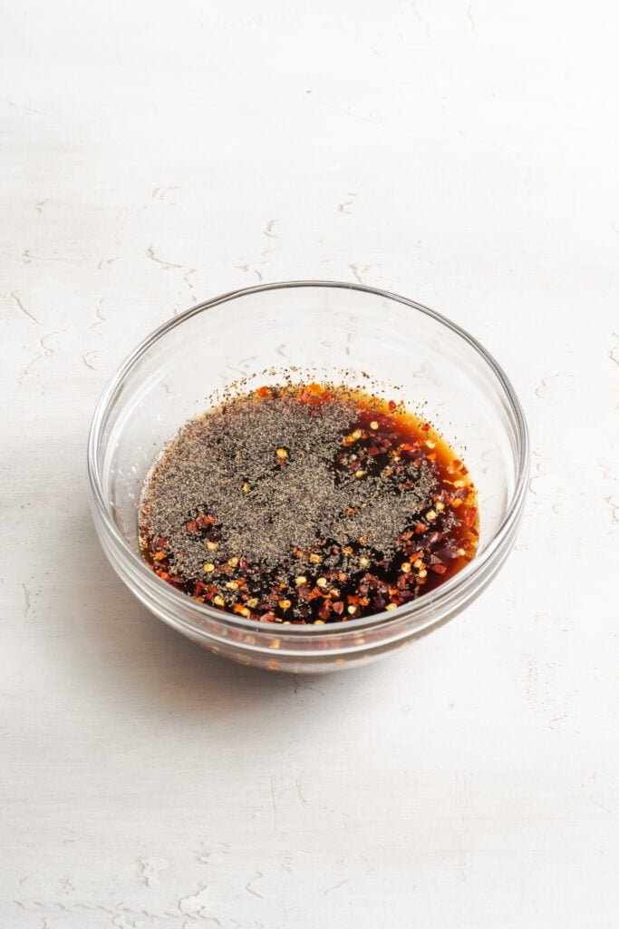 ground beef pepper rice bowl sauce ingredients added to a small mixing bowl.