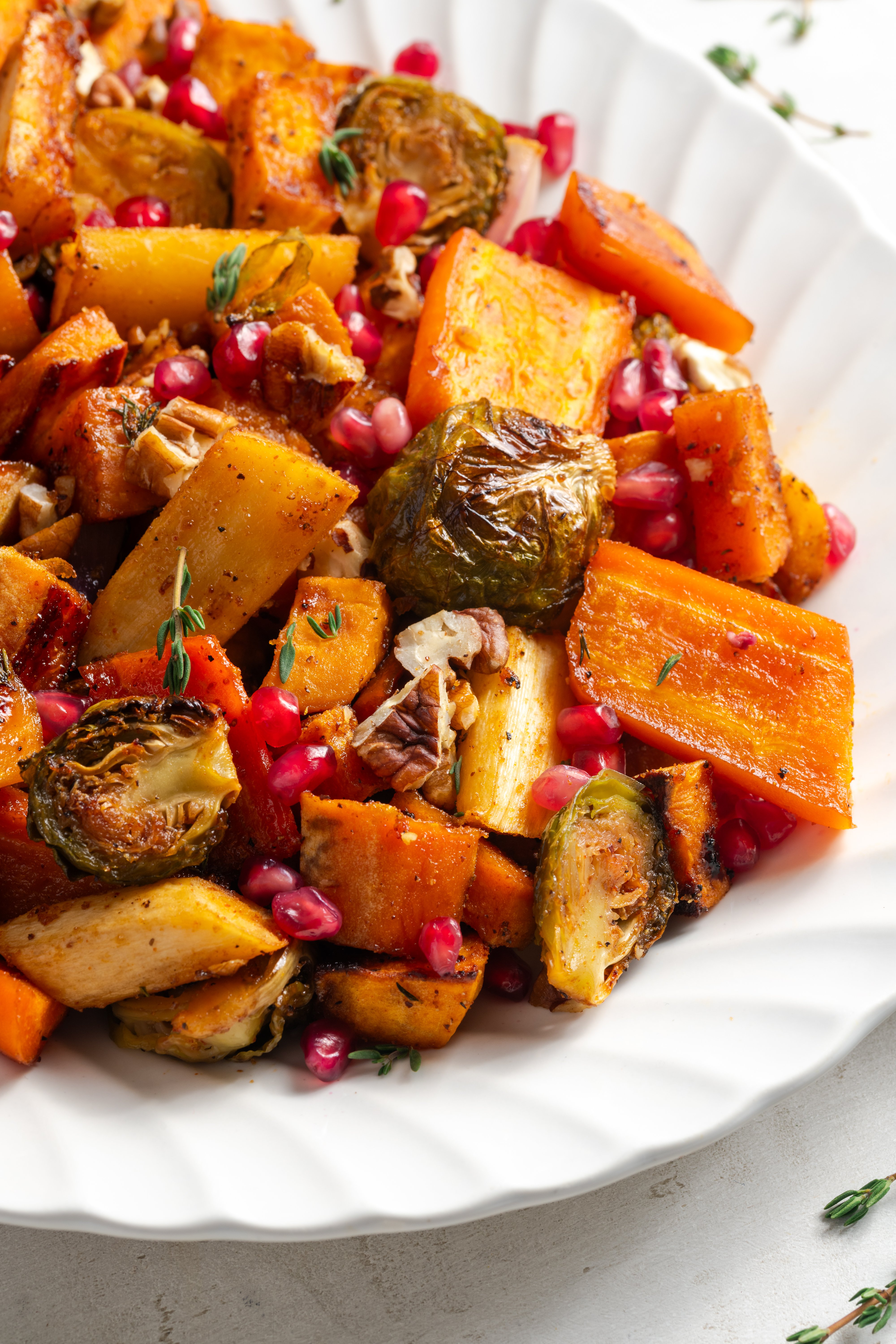 closeup shot of the right half of a serving platter of fall roasted veggies.