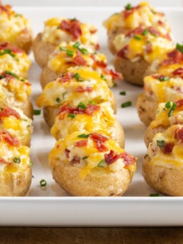 closeup shot of twice baked loaded baby potatoes.