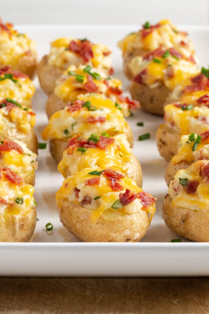 closeup shot of twice baked loaded baby potatoes.