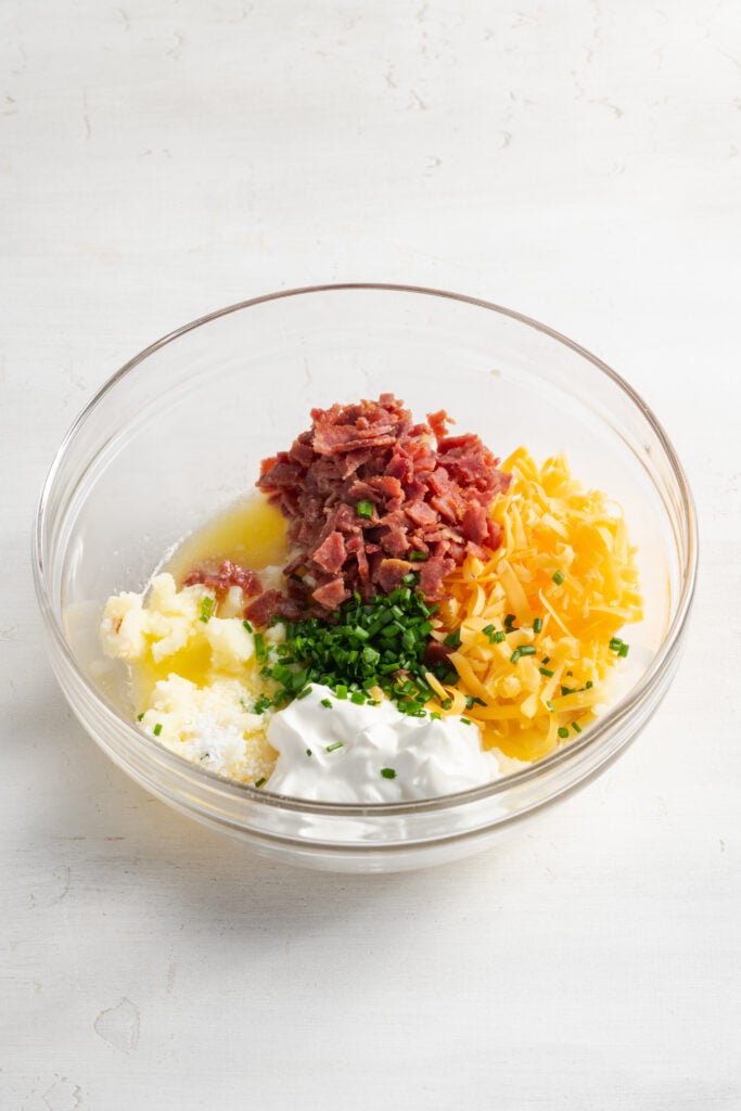 twice baked potato mixture ingredients in a mixing bowl.
