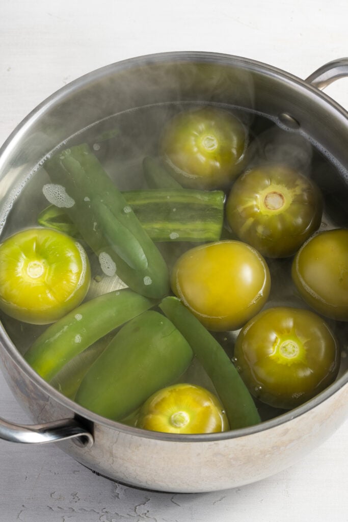 boiled tomatillos and peppers after cooking until they are a dull green.