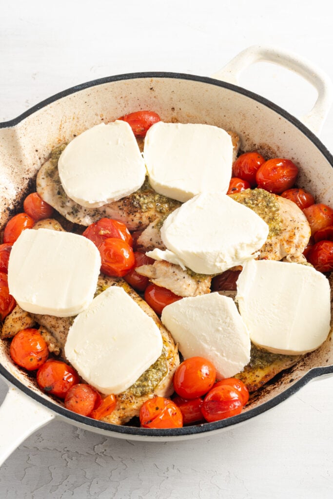 fresh mozzarella layered over the pesto-topped chicken.