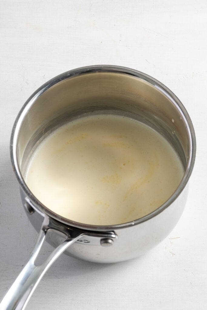 blended garlic mojo sauce in a small saucepan to simmer and reduce.