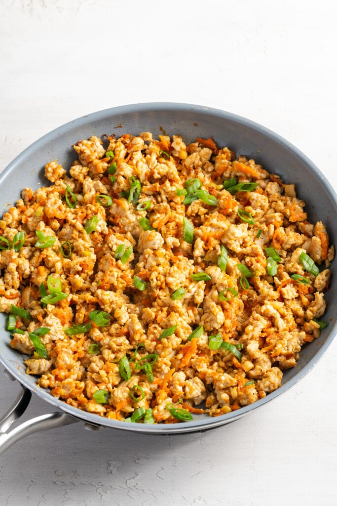 ground turkey filling for Asian lettuce wraps after stirring in the green onion tops.