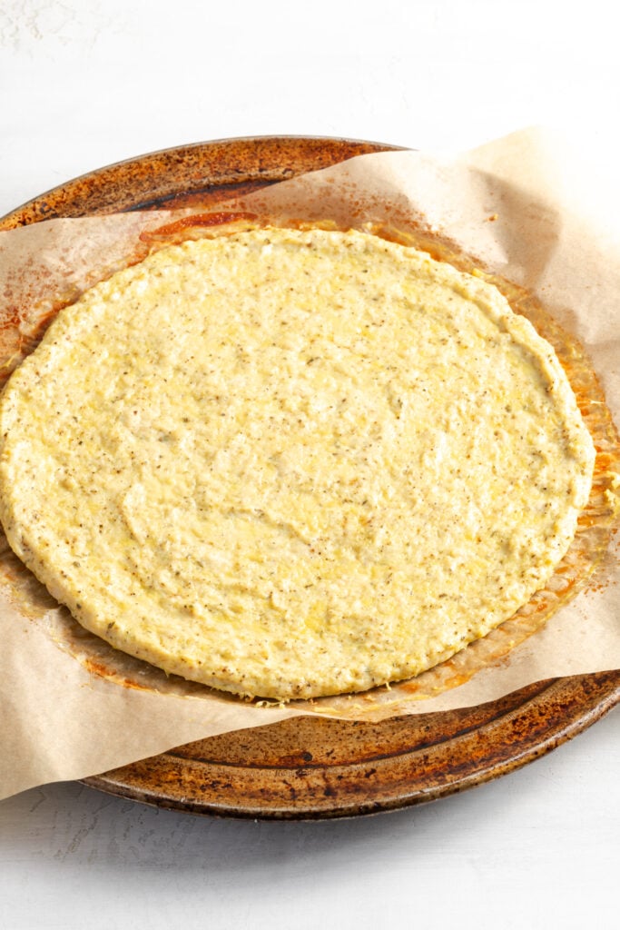 baked chicken pizza crust before adding toppings.
