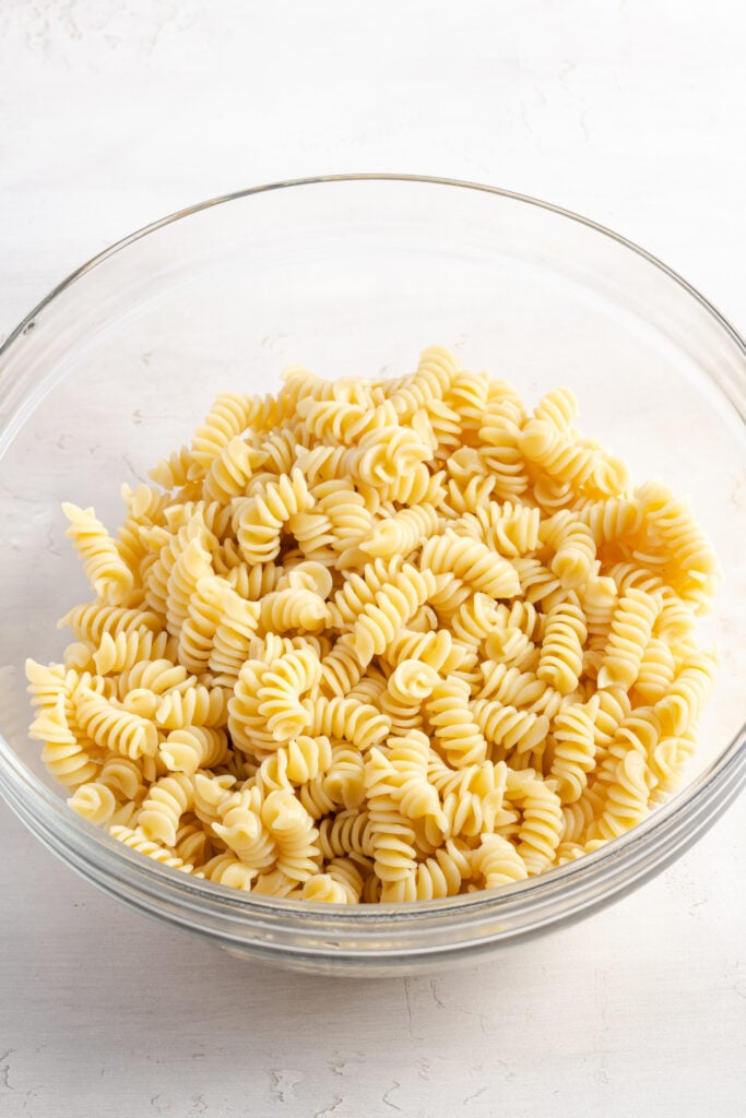cooked rotini pasta in a large mixing bowl.